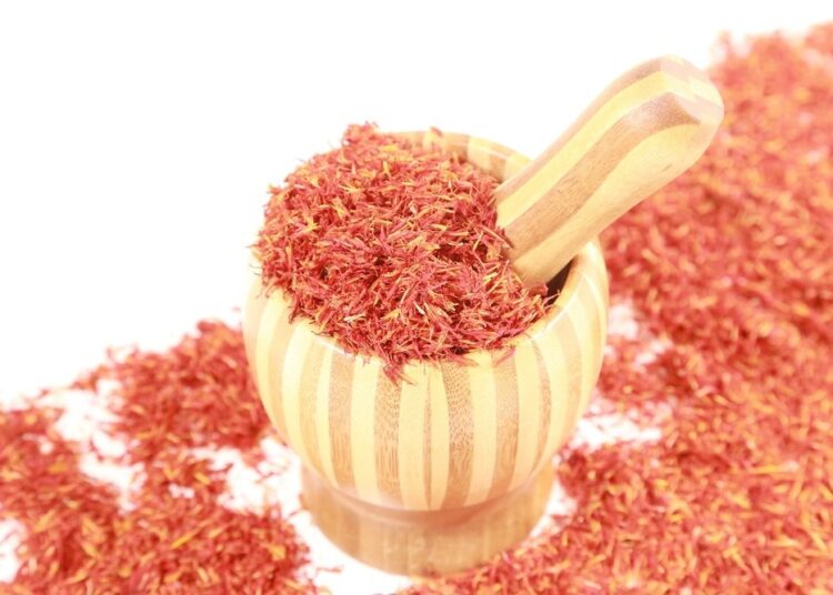 Study: Honghua extract mediated potent inhibition of COVID-19 host cell pathways. Image Credit: Jiang Zhongyan/Shutterstock