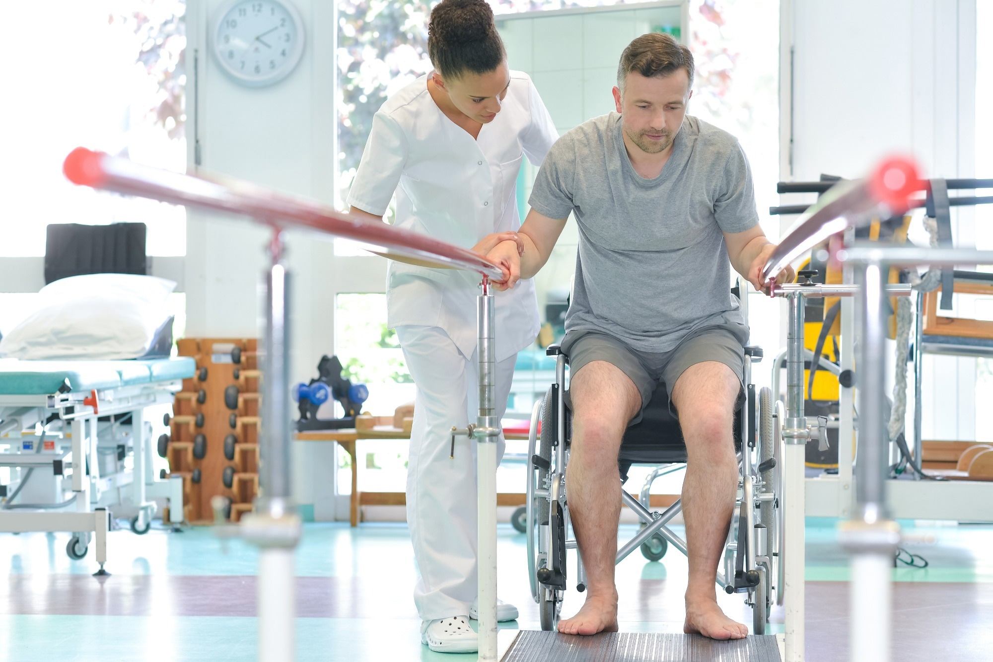 Study: Walking naturally after spinal cord injury using a brain–spine interface. Image Credit: ALPAPROD/Shutterstock.com