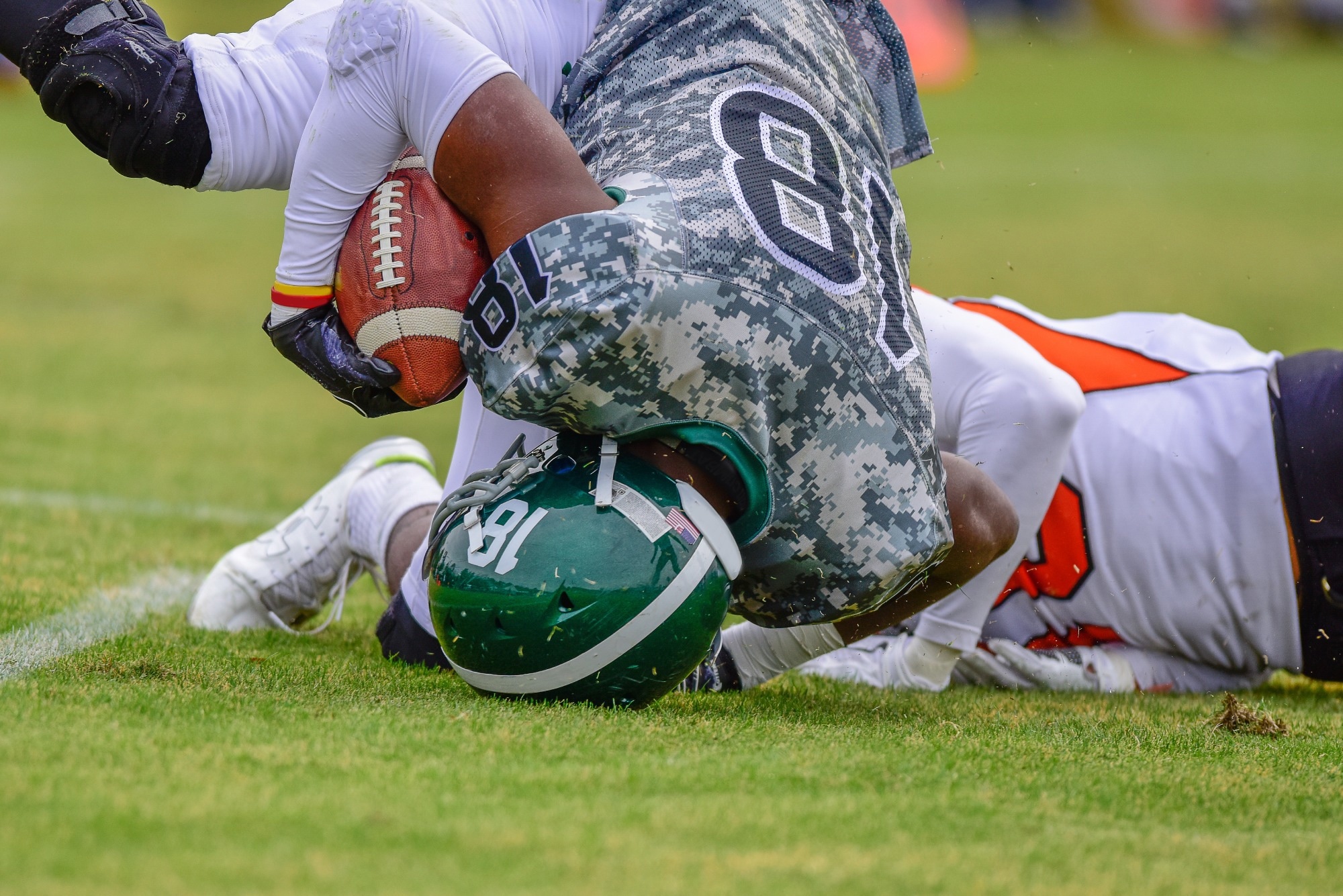 Neuropathologic and Clinical Findings in Young Contact Sport Athletes Exposed to Repetitive Head Impacts