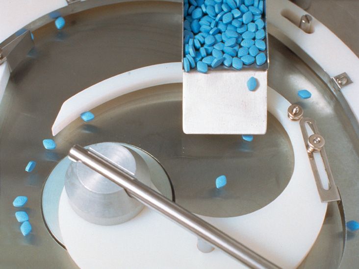 Blue Viagra pills in a factory
