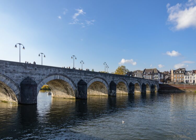 Sint Servaasbrug, historical footbridge crossing Meuse River, and background of cityscape in Maastricht, Netherlands. Study: The association of neighborhood walkability and food environment with incident cardiovascular disease in The Maastricht Study. Image Credit: Peeradontax / Shutterstock