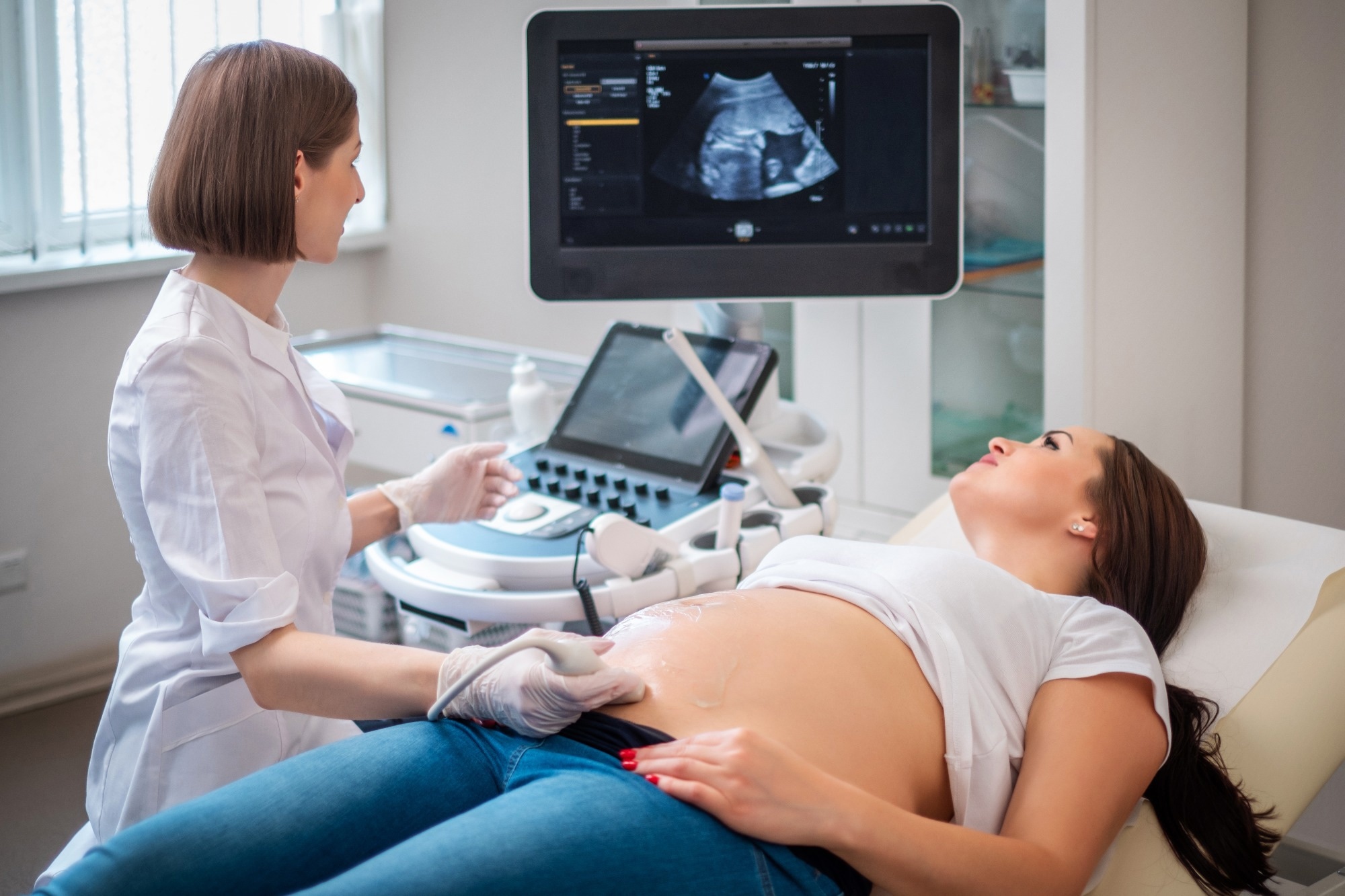 Pregnant woman on ultrasonographic examination at hospital