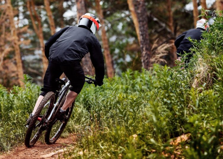 Study: Road cycling causes more serious injuries than mountain biking. Image Credit: Real Sports Photos / Shutterstock