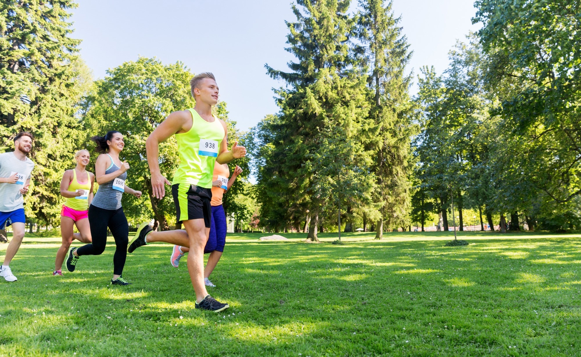 group of happy people running