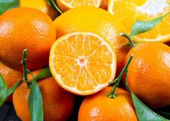 background bunch of fresh tangerines oranges