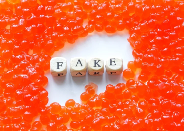Fake red caviar. Study: The cost of food fraud in the UK: Measurement and implications. Image Credit: s880 / Shutterstock